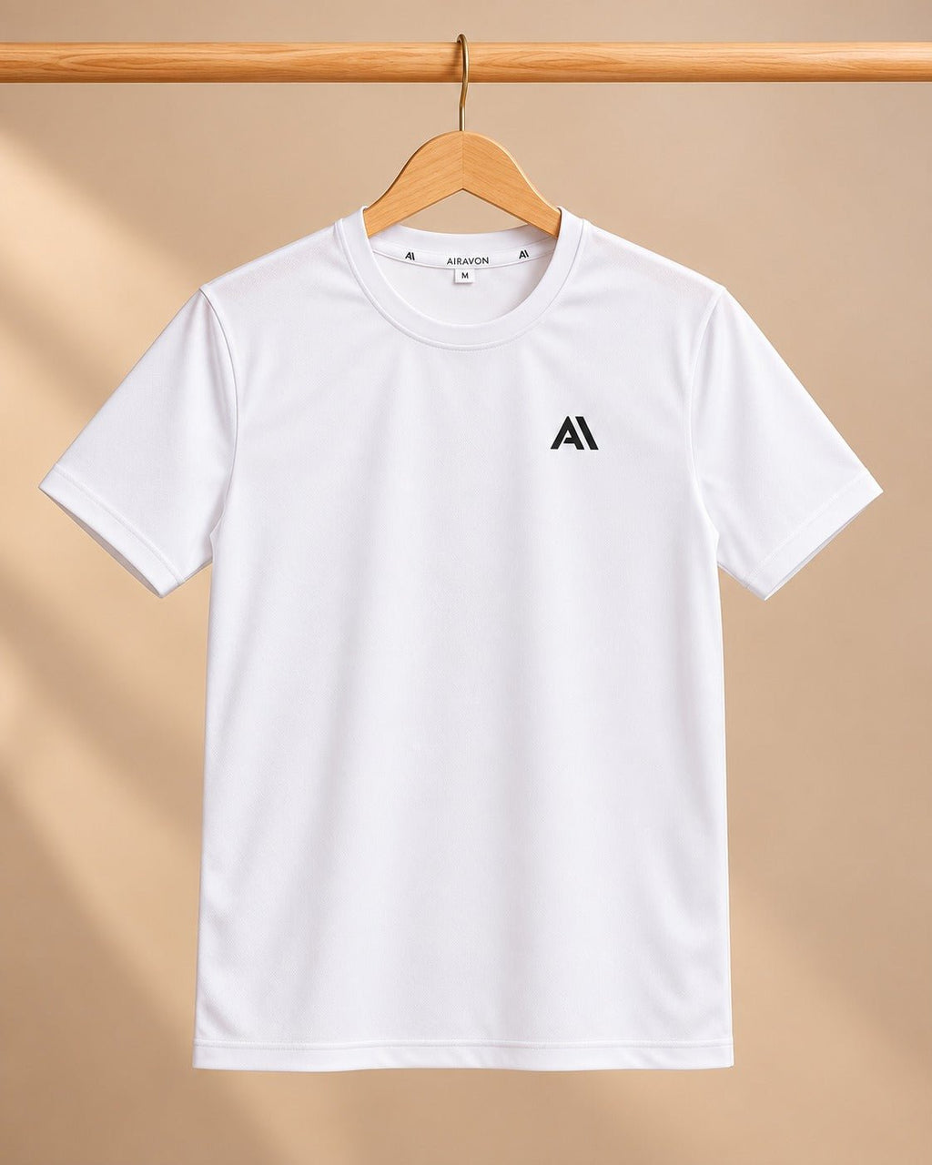 Airavon White sports T-shirt on a wooden hanger