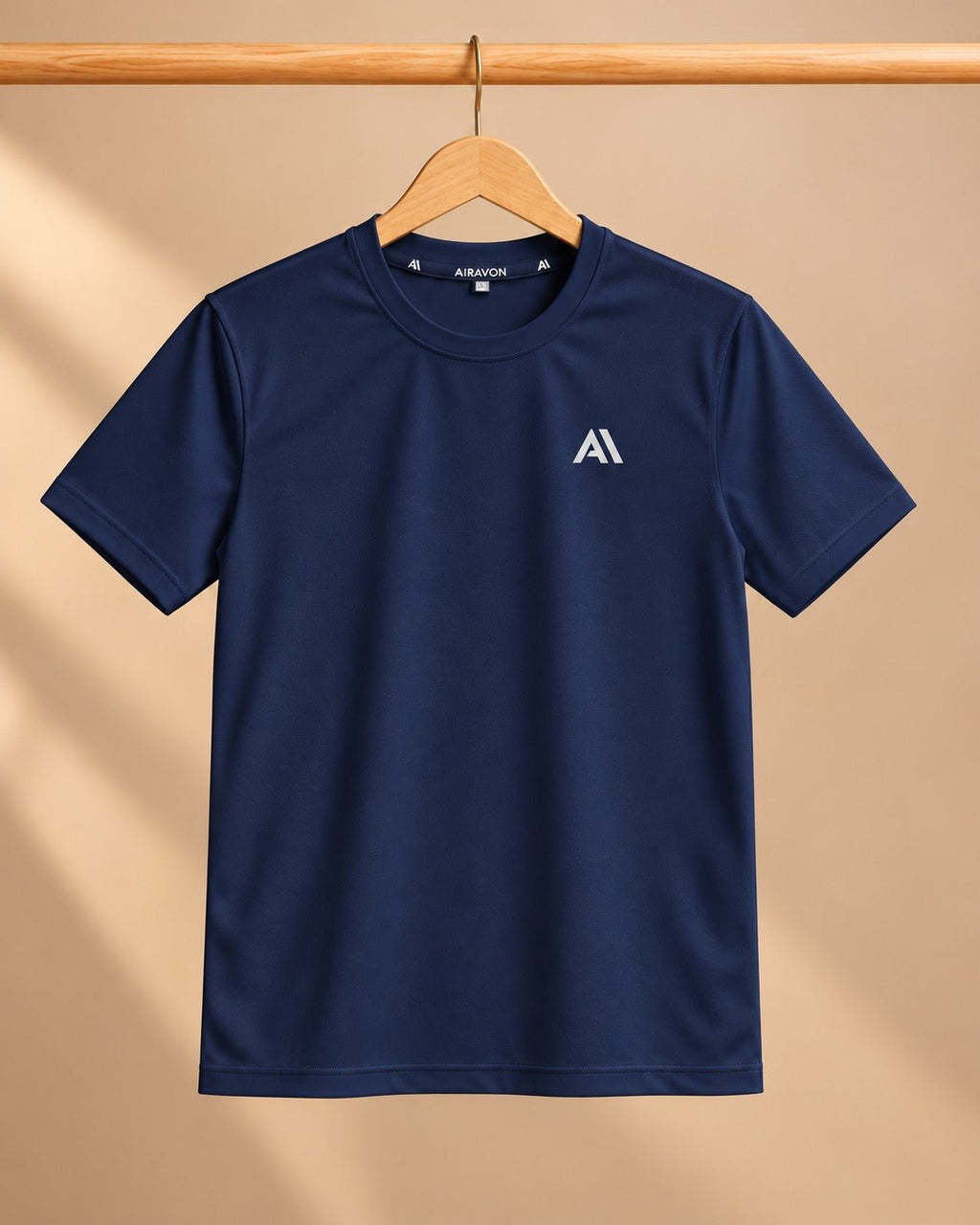 Airavon Navy sports T-shirt on a wooden hanger