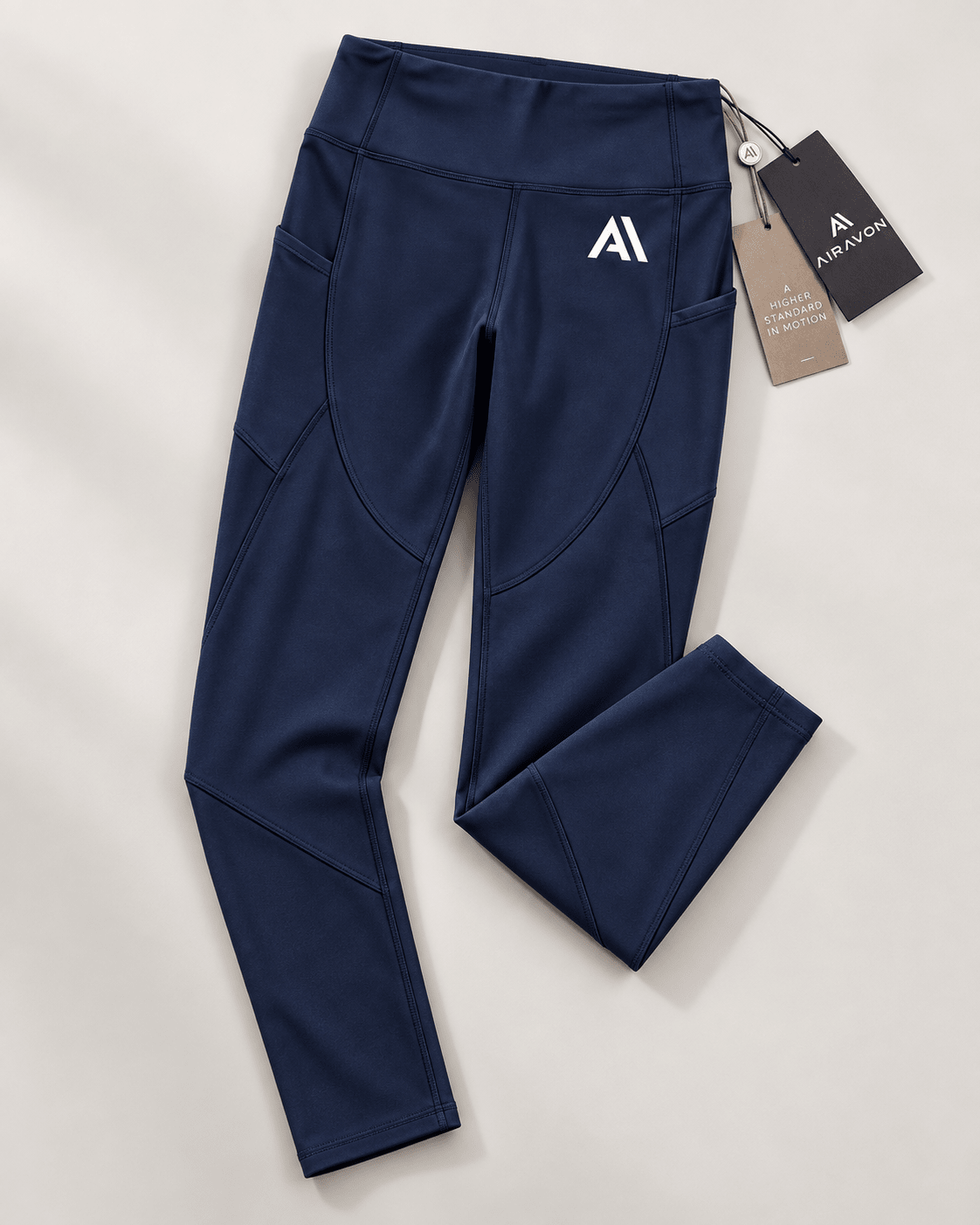 Airavon Navy leggings laid flat with tags