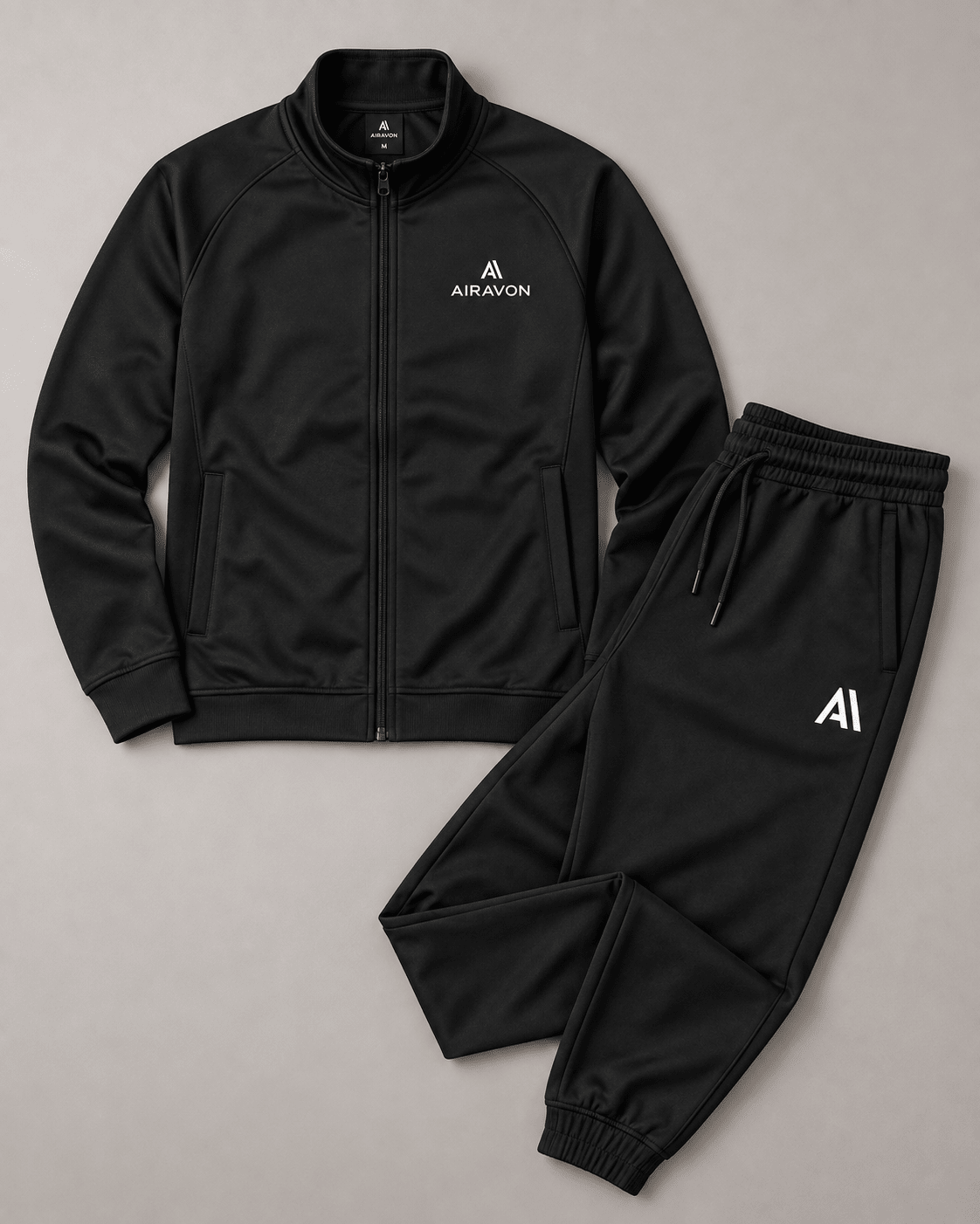 Airavon Black tracksuit jacket and trousers laid flat