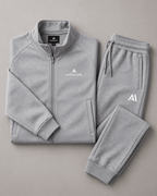 Airavon Light grey tracksuit jacket and trousers laid flat