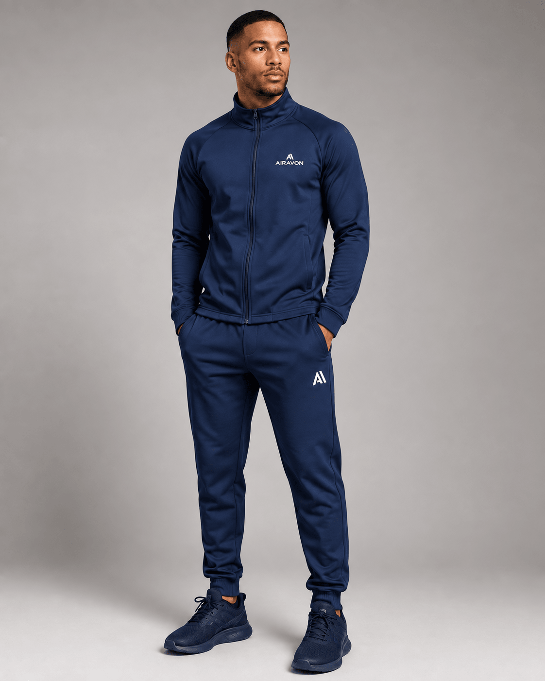 Airavon Model wearing a navy tracksuit, studio view